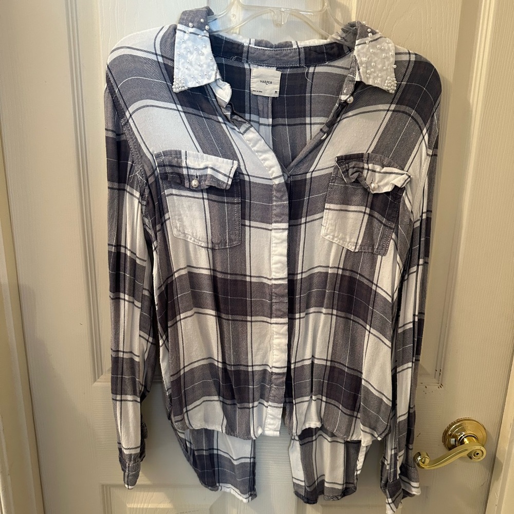 Grey flannel with pearl beading along the top. Size medium. Brand Harper.